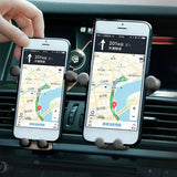 Soporte universal para teléfono de coche con salida de aire por gravedad para teléfonos móviles y GPS