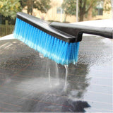 Cepillo de limpieza retráctil para automóviles con flujo de agua